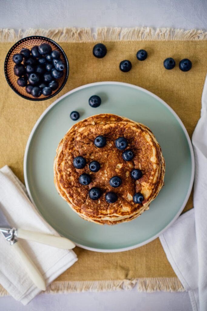 hormone healthy pancakes topped with blueberries