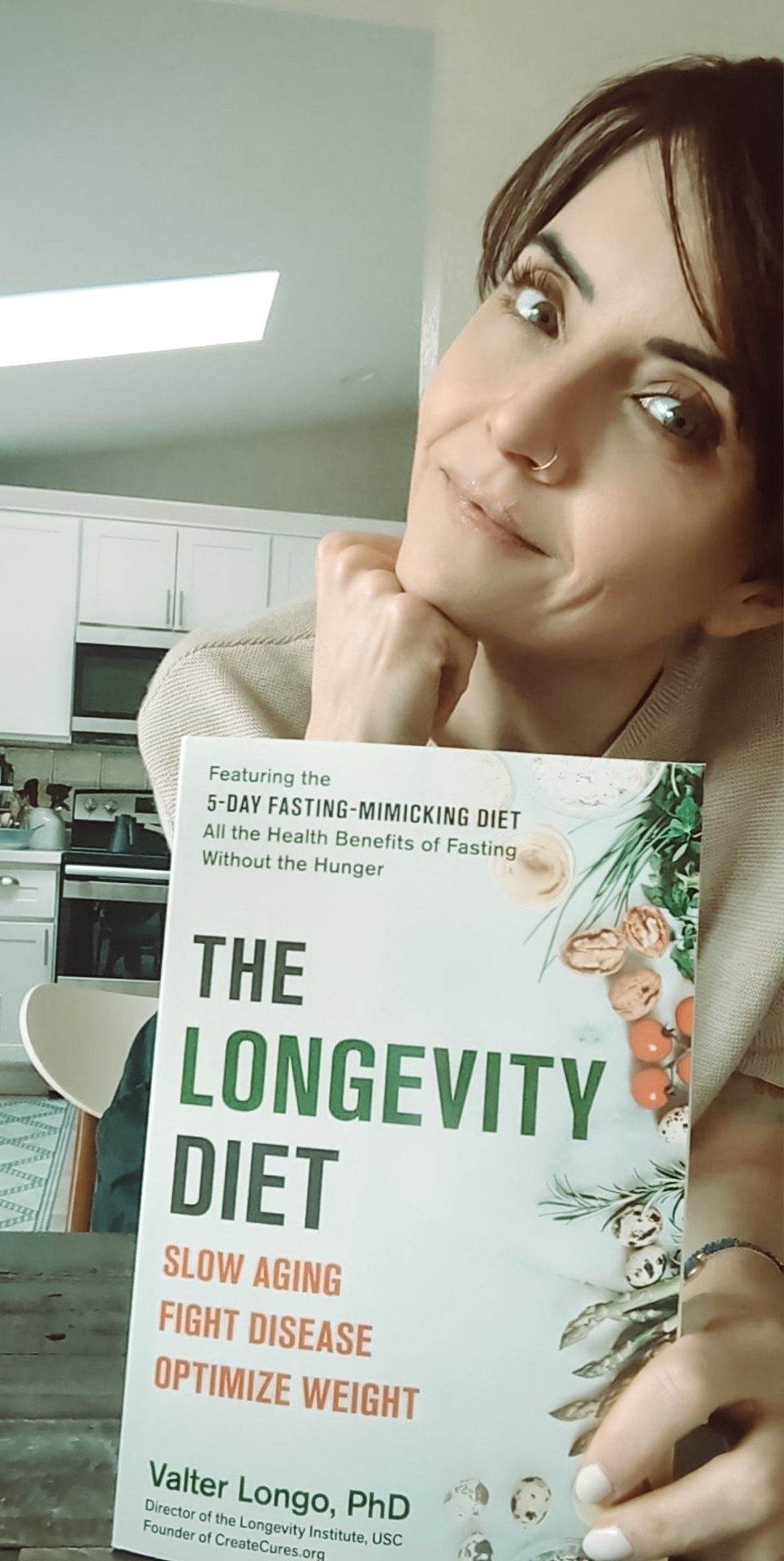 Author with the book The Longevity Diet: Slow Aging Fight Disease Optimize Weight by Valter Longo, PhD