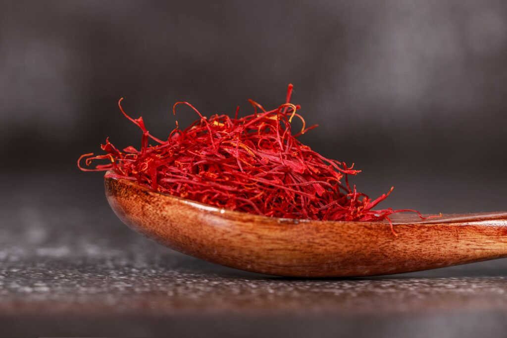 Saffron in a wooden spoon