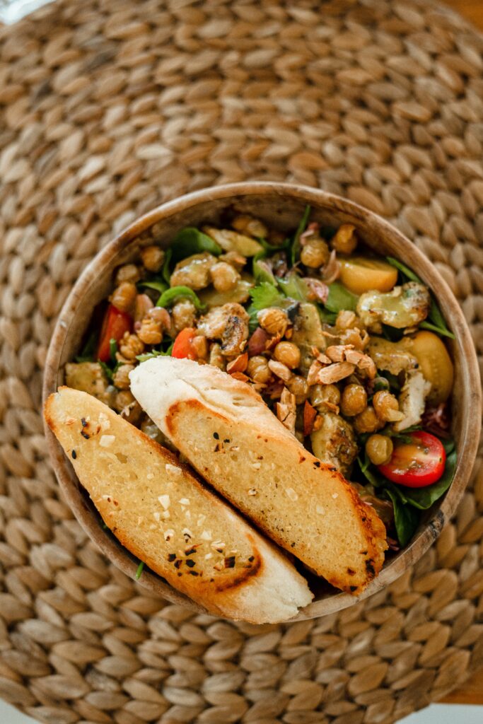 Healthy lunch bowl with roasted vegetables_ legumes and bread (Thawed, so better for glucose levels).