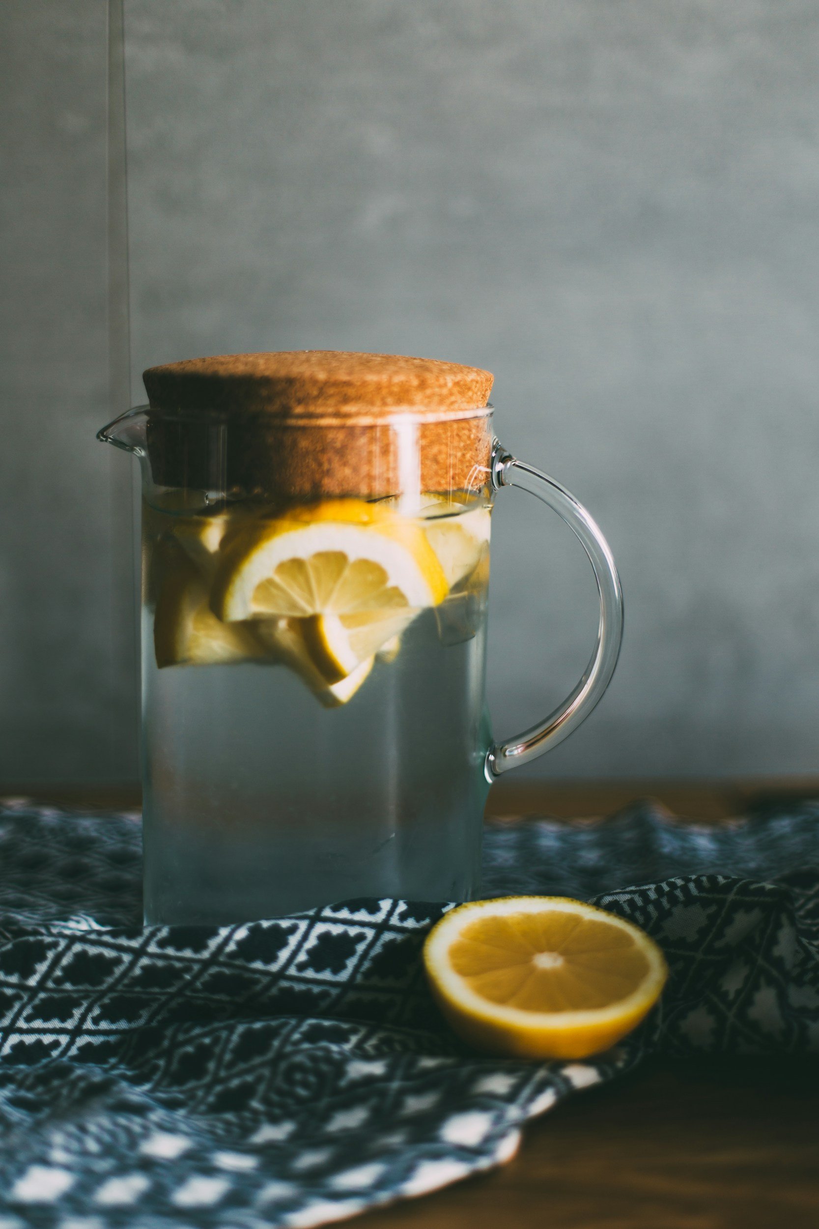 water with slices of lemon in a decanter