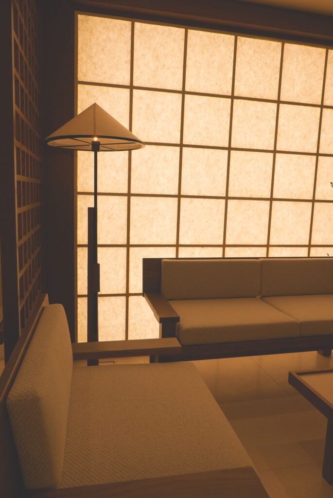 Minimalist interior with warm lighting and geometric window design