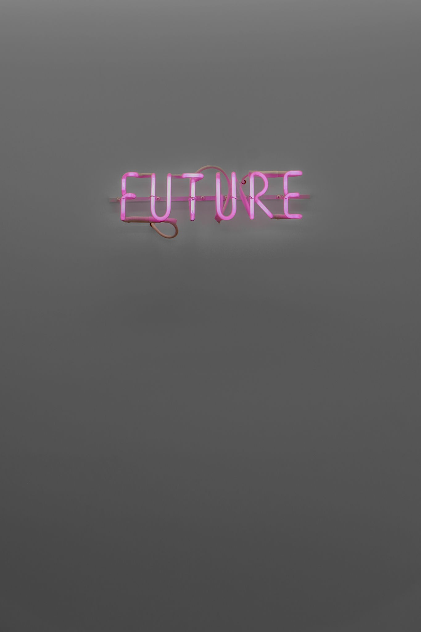 Lost In Translation - Pink neon FUTURE sign glowing against gray background